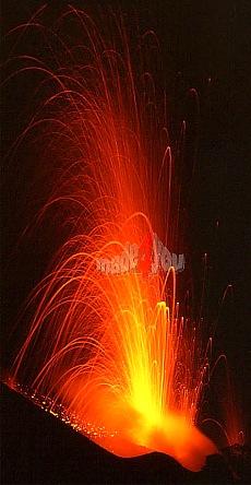 The volcano Stromboli spews fiery lava fountains high into the night sky