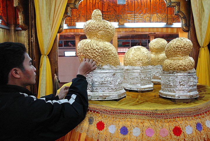 Golden Buddhas at Phaung-Daw-Oo-Monastery in Ywama