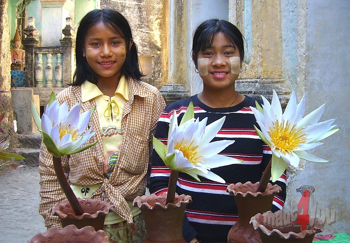 Lovely girls selling Lotus flowers at Shwe Ba Taung Pagoda
