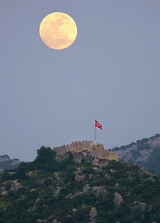 Simena fortress with rising moon