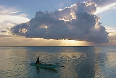 Lonesome Paddler on the beach of Moorea