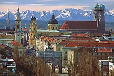 Skyline of Munich with snowcovered mountains