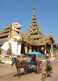 Giant Temple guards and horse cart in Bago