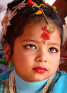 Bored child on a Hindufestival in Kathmandu