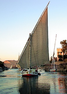 Feluccas cruise on river Nile near Assuan